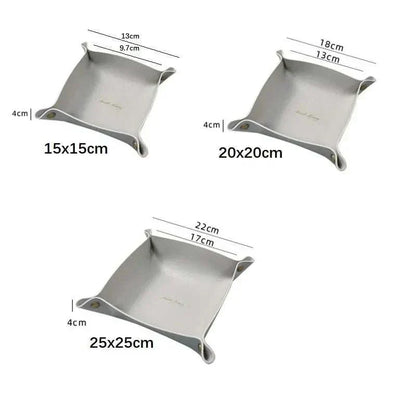 Nordic Leather Desk Tray set with three light grey leather trays in small, medium, and large sizes with folded corners and gold snap buttons.