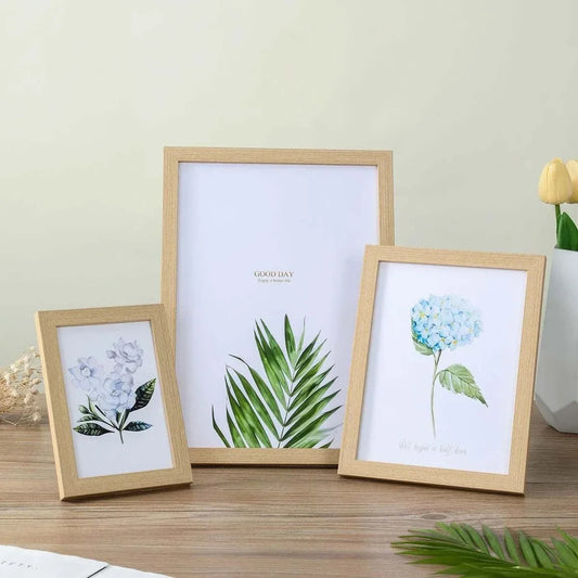Wooden Photo Frame set featuring light natural wood finish with botanical prints, simple rectangular design, and clean edges