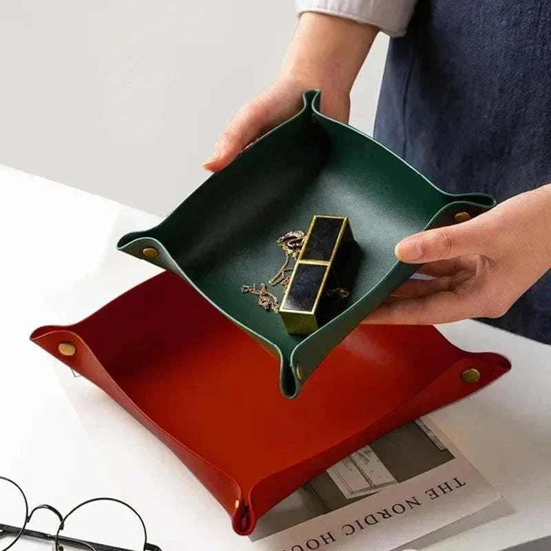 Nordic Leather Desk Tray set showing green and red leather trays with brass button corners, used for organizing small items.