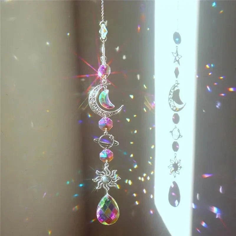Galaxy Star Moon Crystal hanging decor with silver celestial charms and faceted iridescent beads capturing and reflecting light.