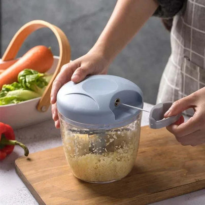 Manual Meat Mincer with light blue plastic lid, clear container, and pull-cord handle for easy chopping and mincing.