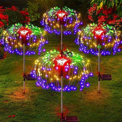 Dandelion Firework Lights with colorful LED bulbs in red, green, blue, and yellow on metal stems creating glowing floral bursts for garden decoration