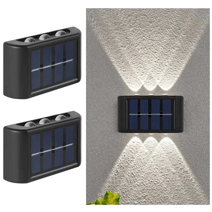 Outdoor Waterproof Fence Lamp in black with a rectangular shape and solar panels, emitting symmetrical upward and downward white lights