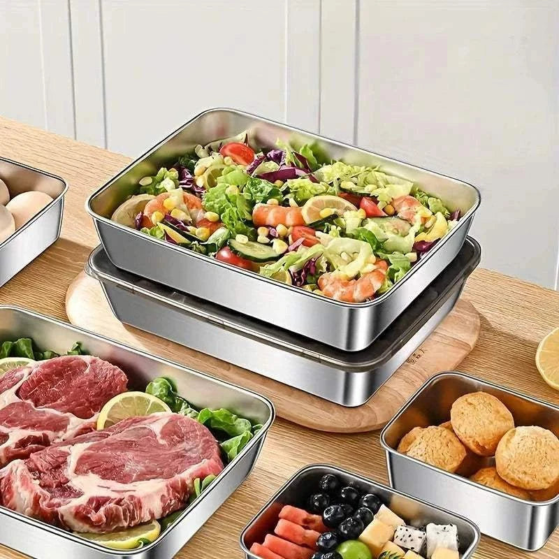 Stainless Steel Food Storage Container sets with square and rectangular shapes holding fresh salad, raw meat, blueberries, and biscuits
