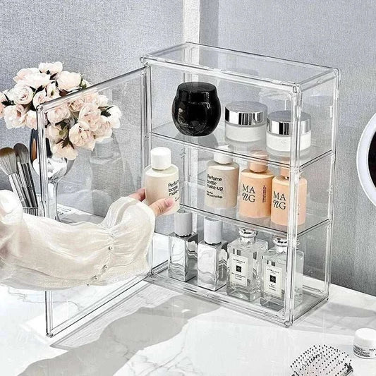 Transparent Acrylic Organizer clear storage box with open door holding various skincare and cosmetic bottles on three shelves